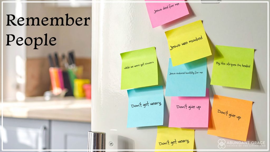 Fridge with sticky notes on it.